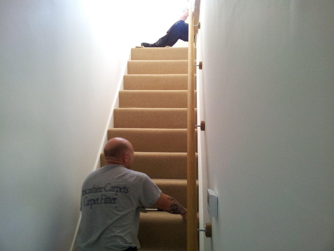 stairs carpeting by one of the lancashire carpets teams part of a full house carpeting project with substantial discounts