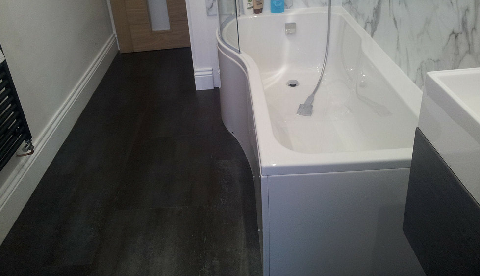 Bathroom vinyl fitted by rawtenstall vinyl flooring supplier and fitter company lancashire carpets